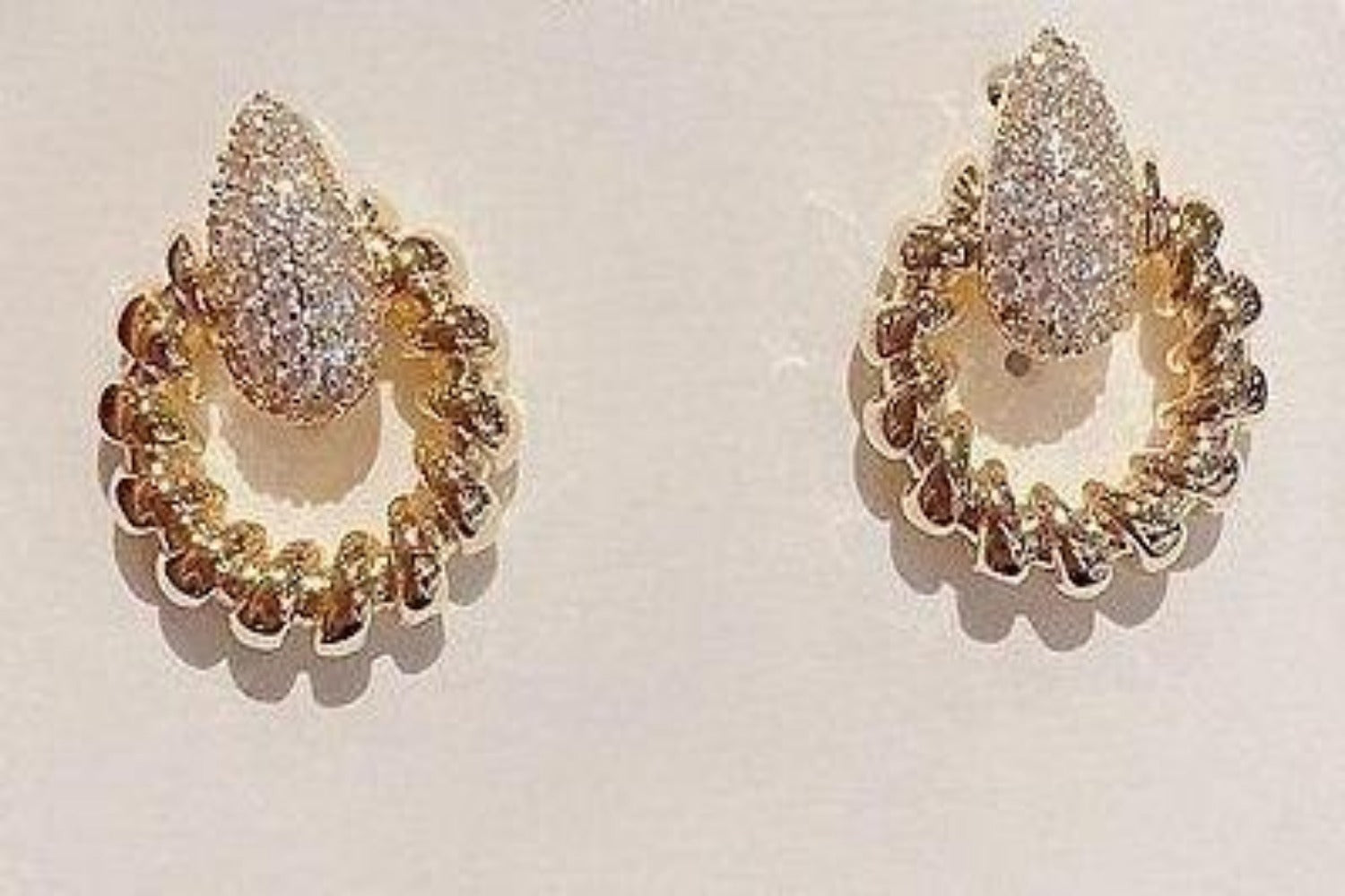 Exquisite Cubic Zircon Twisted Rope Gold Finish Studs.