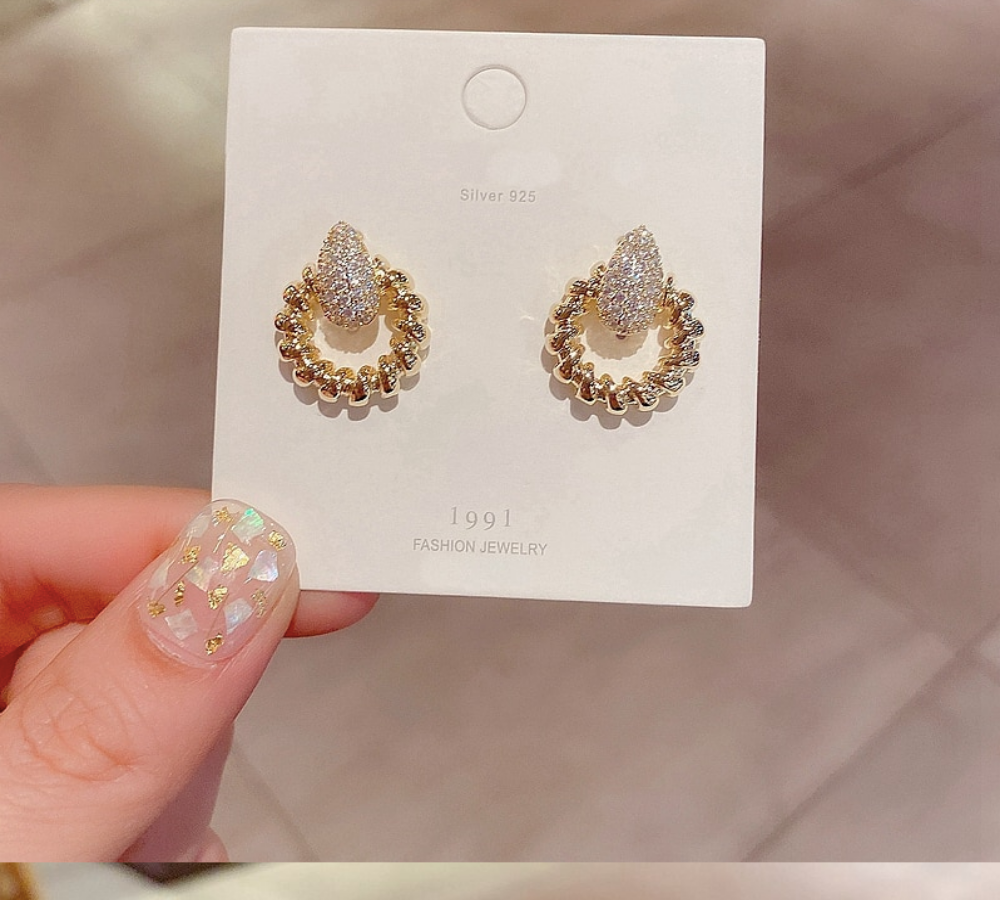 Exquisite Cubic Zircon Twisted Rope Gold Finish Studs.
